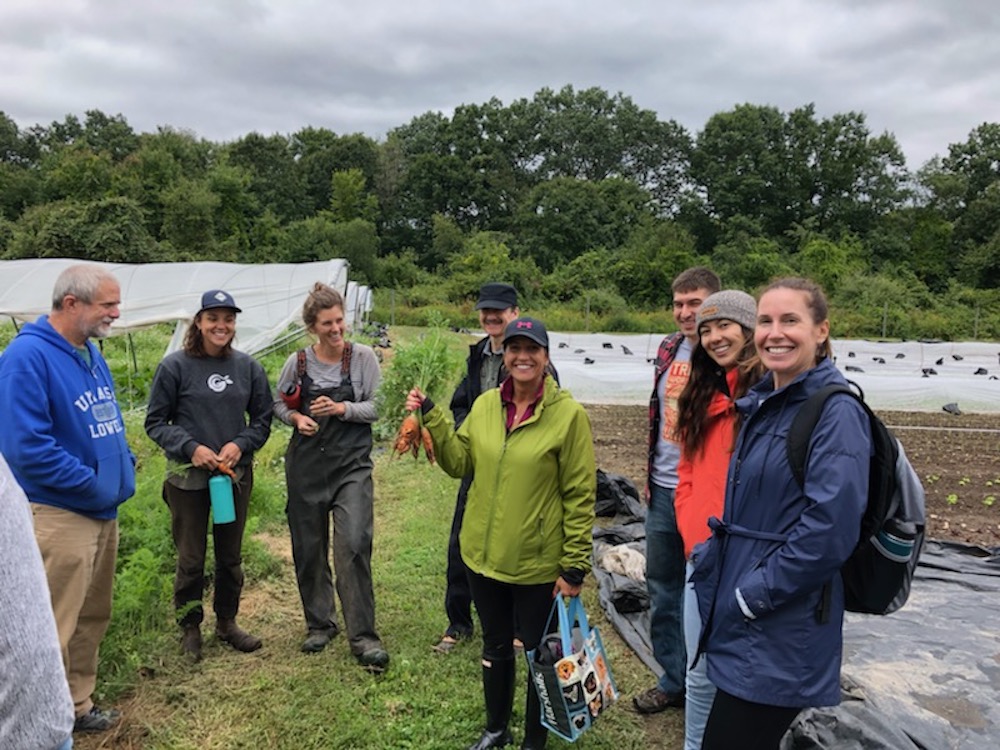 Lincoln Laboratory volunteers gather for a group photo with their recent harvest.