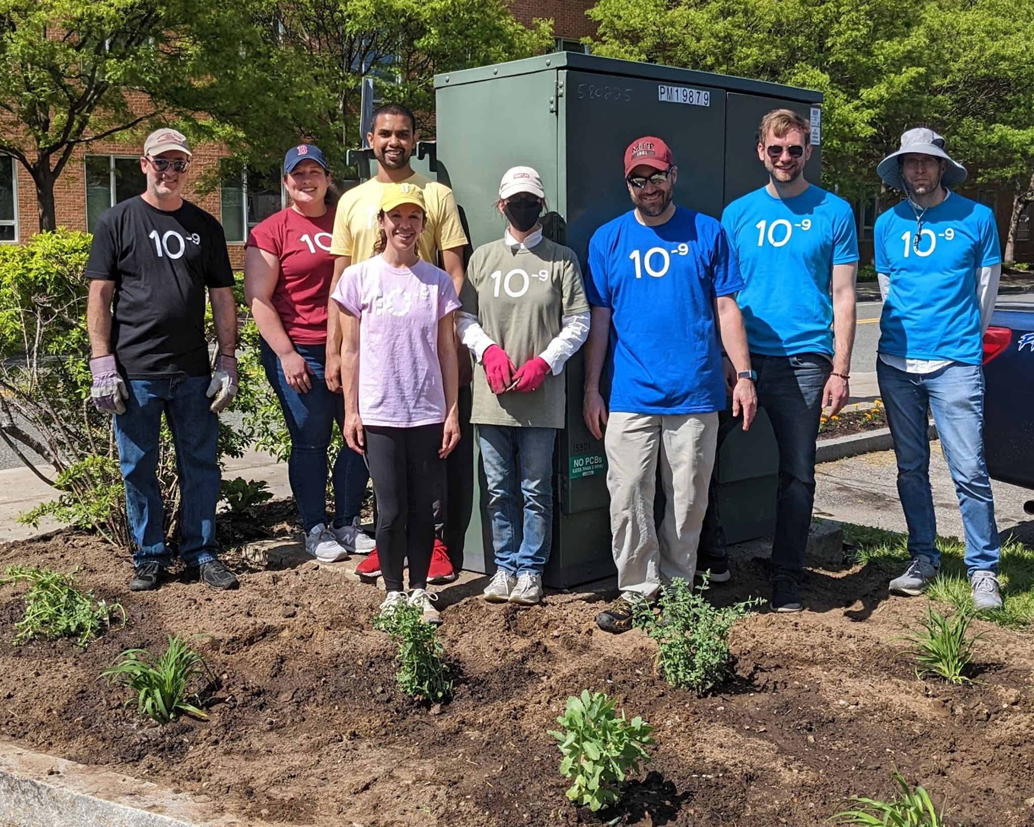 The volunteer crew from MIT.nano out in CASPAR's healing garden.