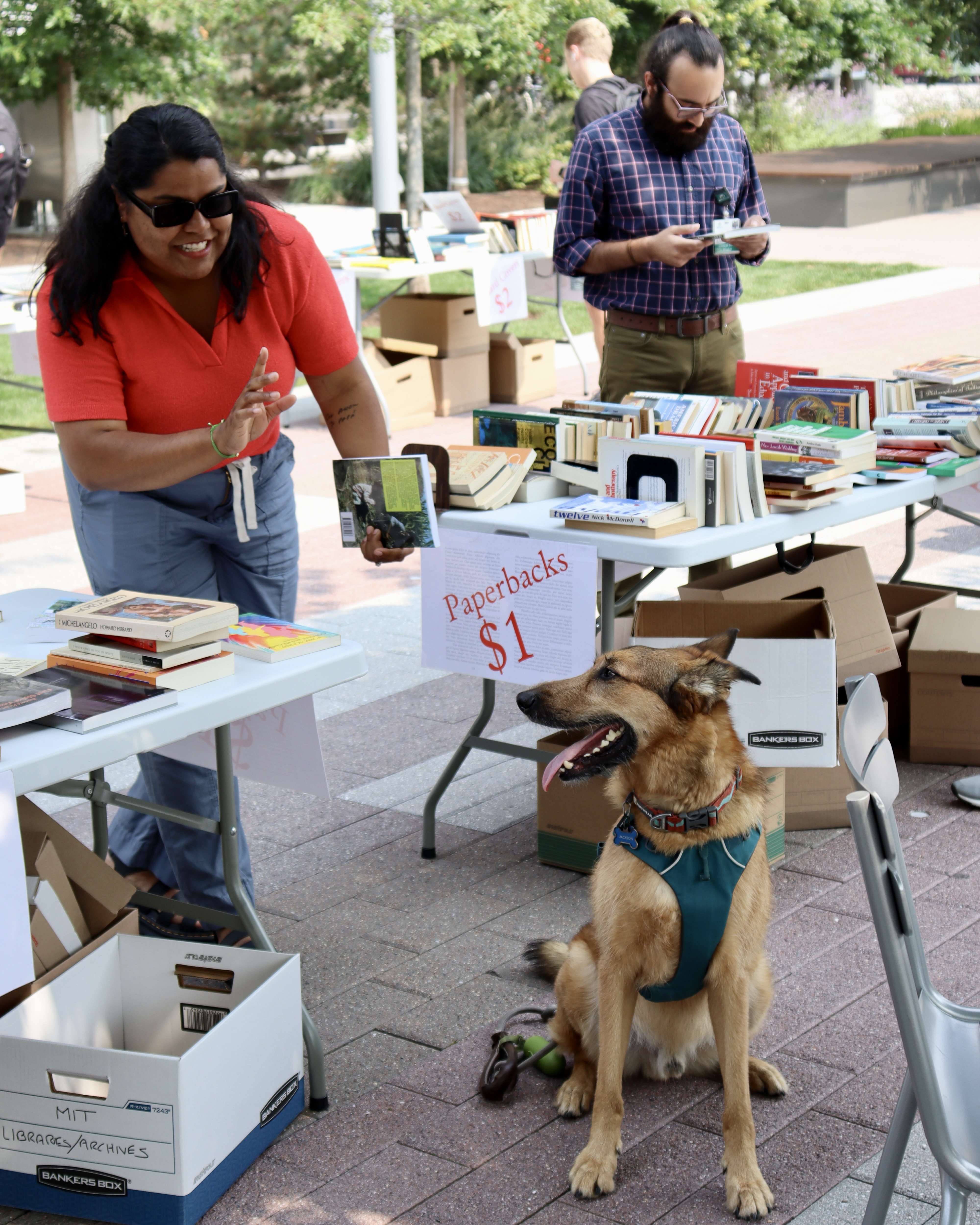 With a stock of books including 50-cent children’s books, dollar paperbacks, and two-dollar hardcover coffee-table books, the used book sale had something for everyone — even the dogs.