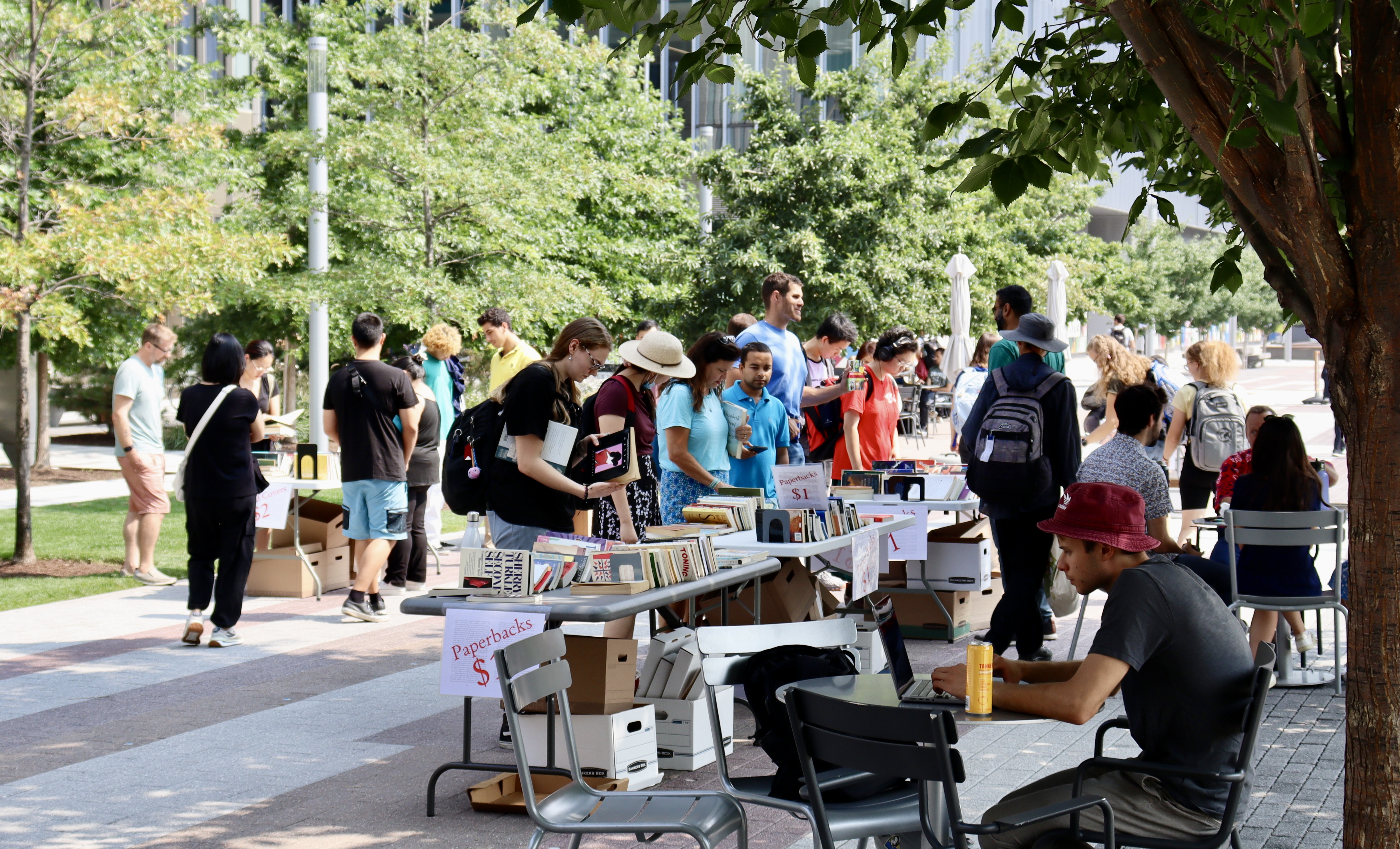 The Kendall/MIT Open Space warmly welcomed community members to a book sale on a hot September day.