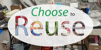 Choose to Reuse imposed over a photo of collected goods.