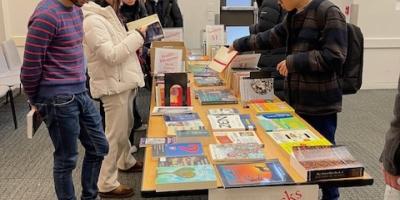 Shoppers browse the selection in the Bush Room during the 2026 Used Book Sale